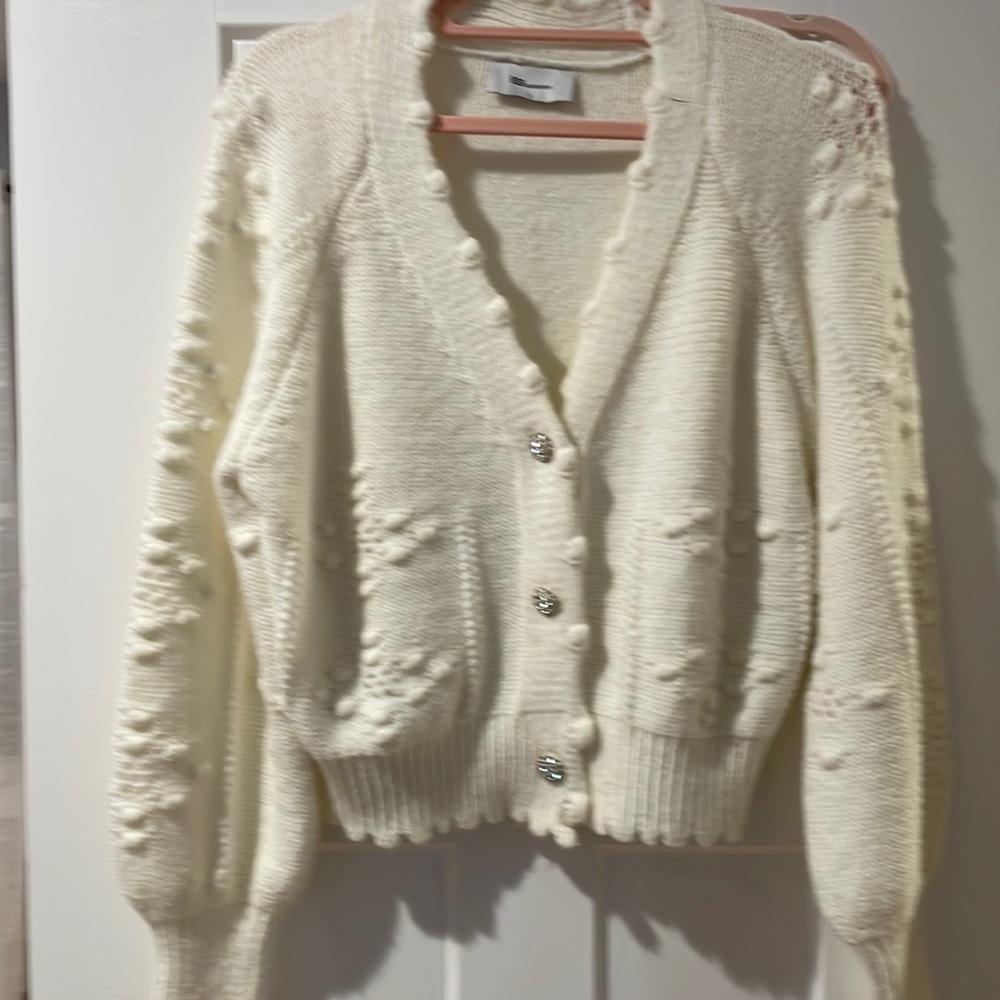Sweater brand new.  Never worn.  Size small